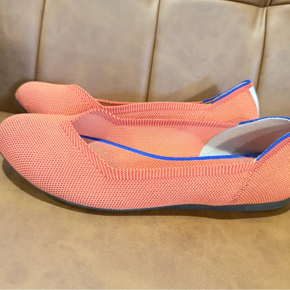 Rothy's Vibrant Orange Flats with Blue Trim